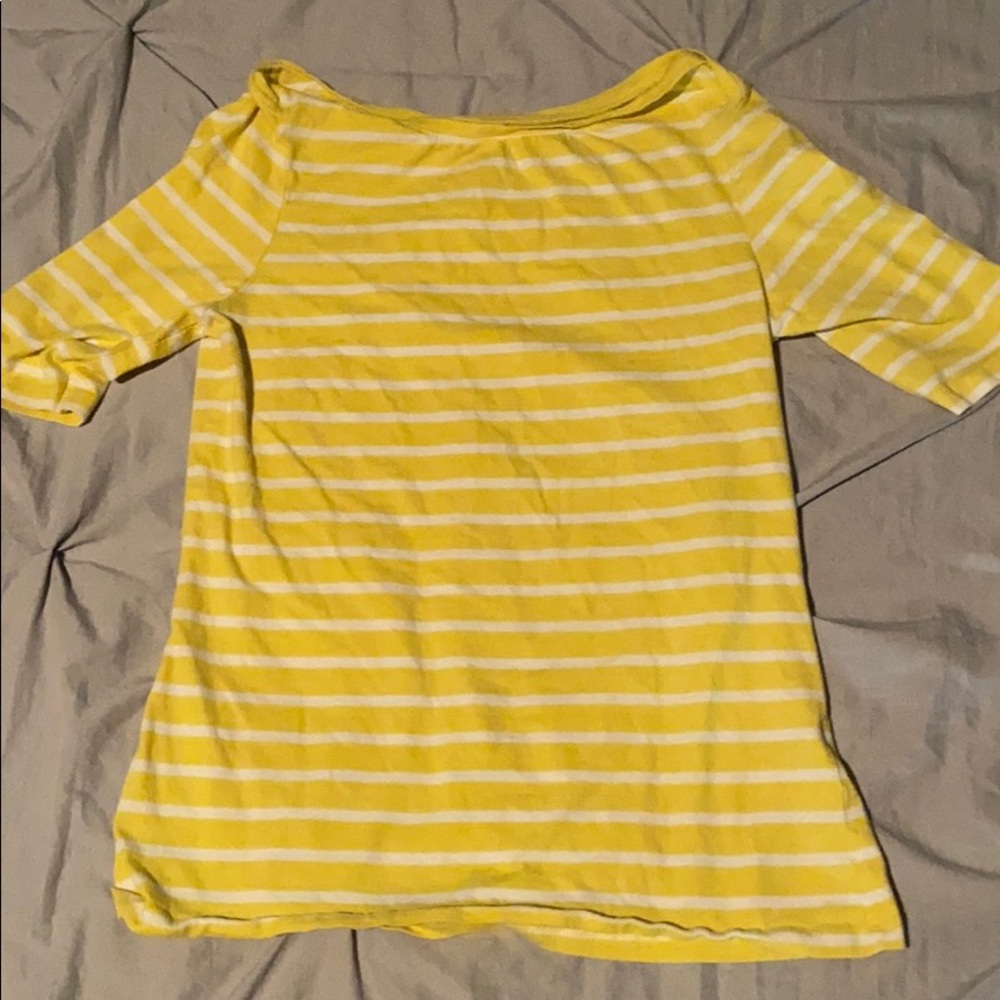 Women’s yellow and white shirt
